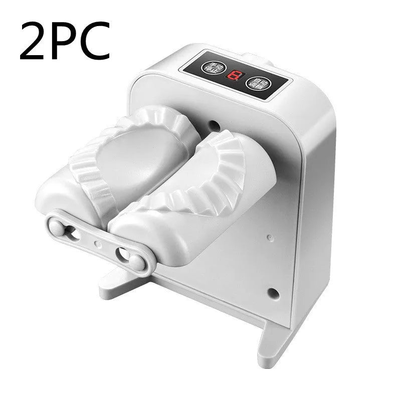 White electric dumpling maker machine with USB cable, brush, and spoon accessories