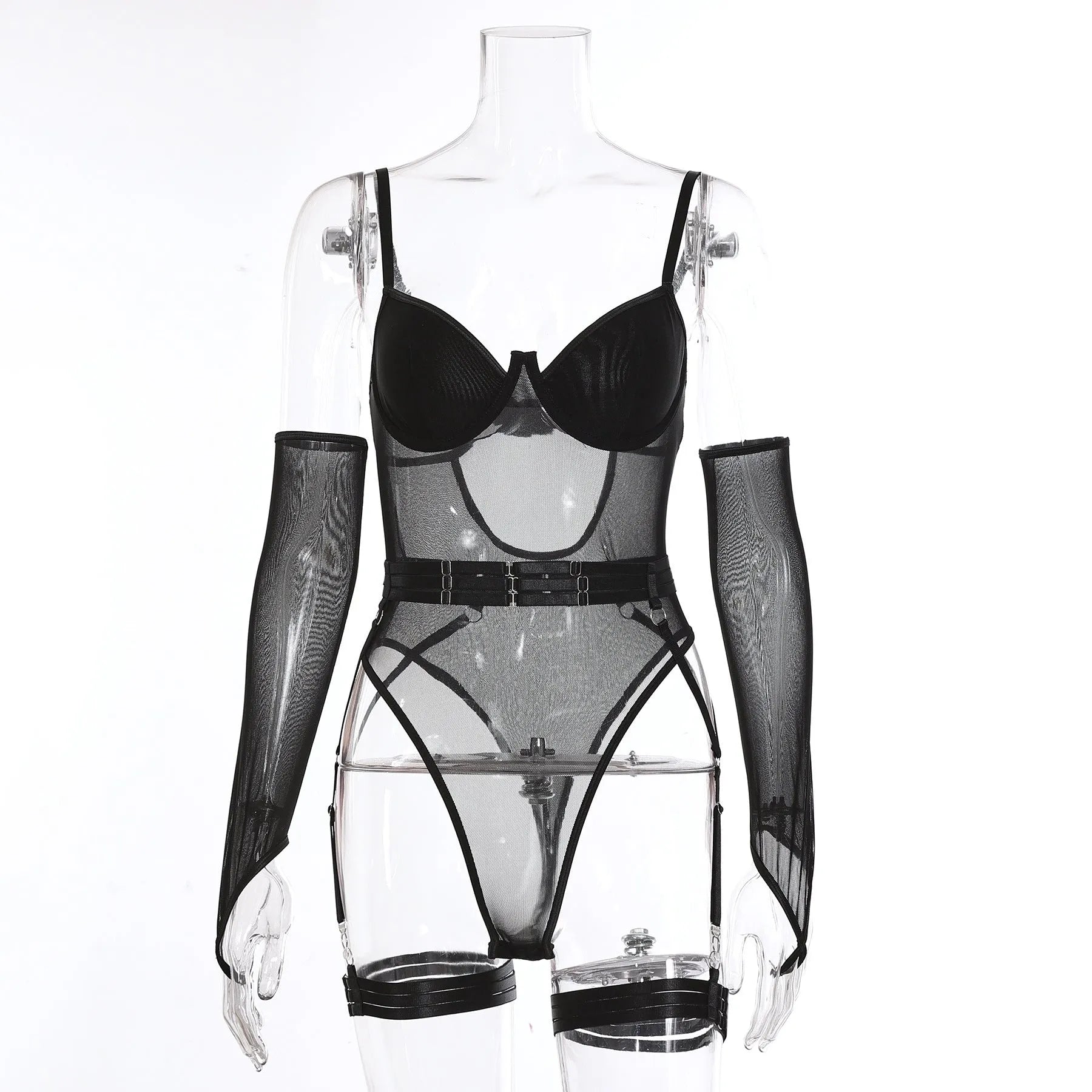 A woman wearing a black see-through mesh jumpsuit, a one-piece garment with long sleeves and legs.