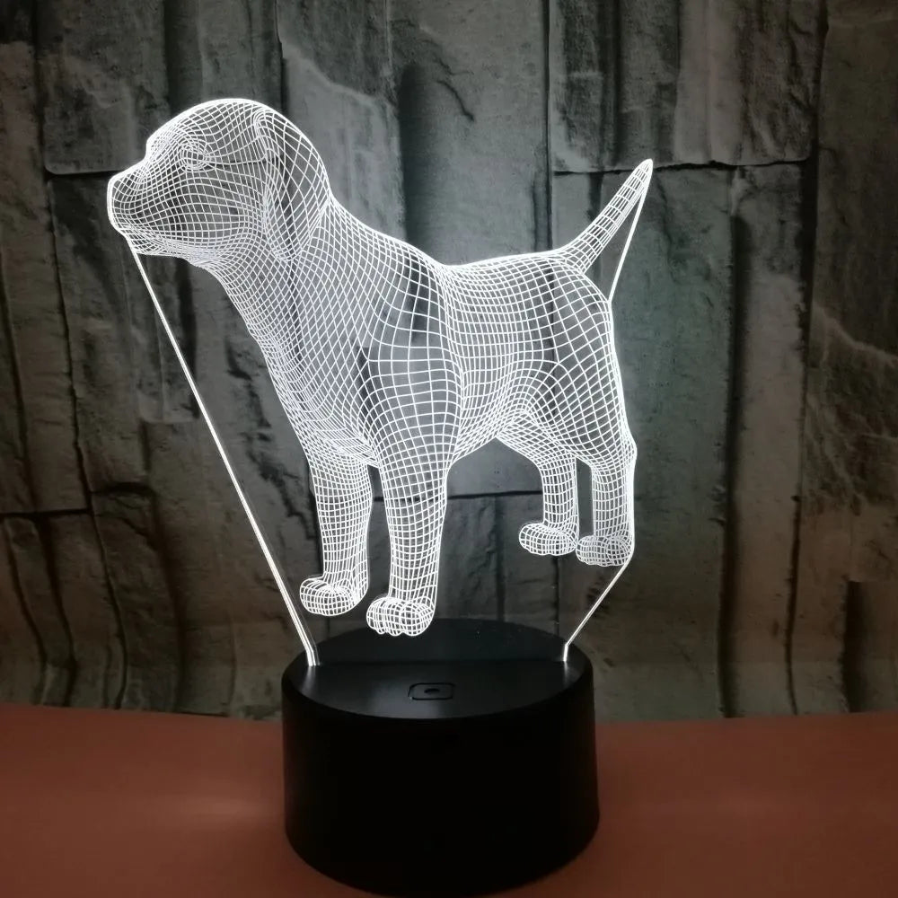 Dog-shaped USB mood lamp showing 7 colours with touch and remote control on a bedside table