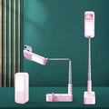 White wireless retractable fill light bracket for smartphone on a desk with LED lighting