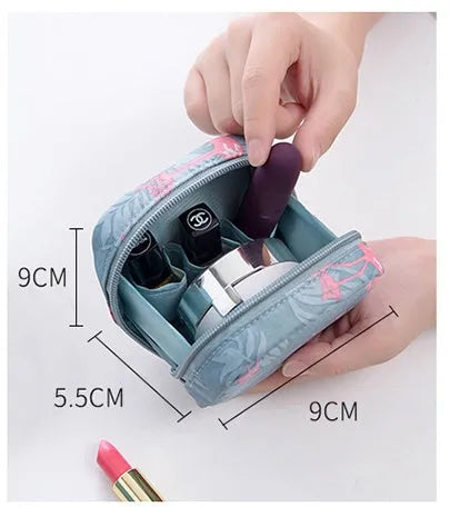 Cloth cube makeup storage bag in blue, pink, white, and white pink colours with a plain pattern.