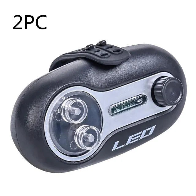 Fishing rod alarm with automatic signal lamp in blue or black colours for night fishing