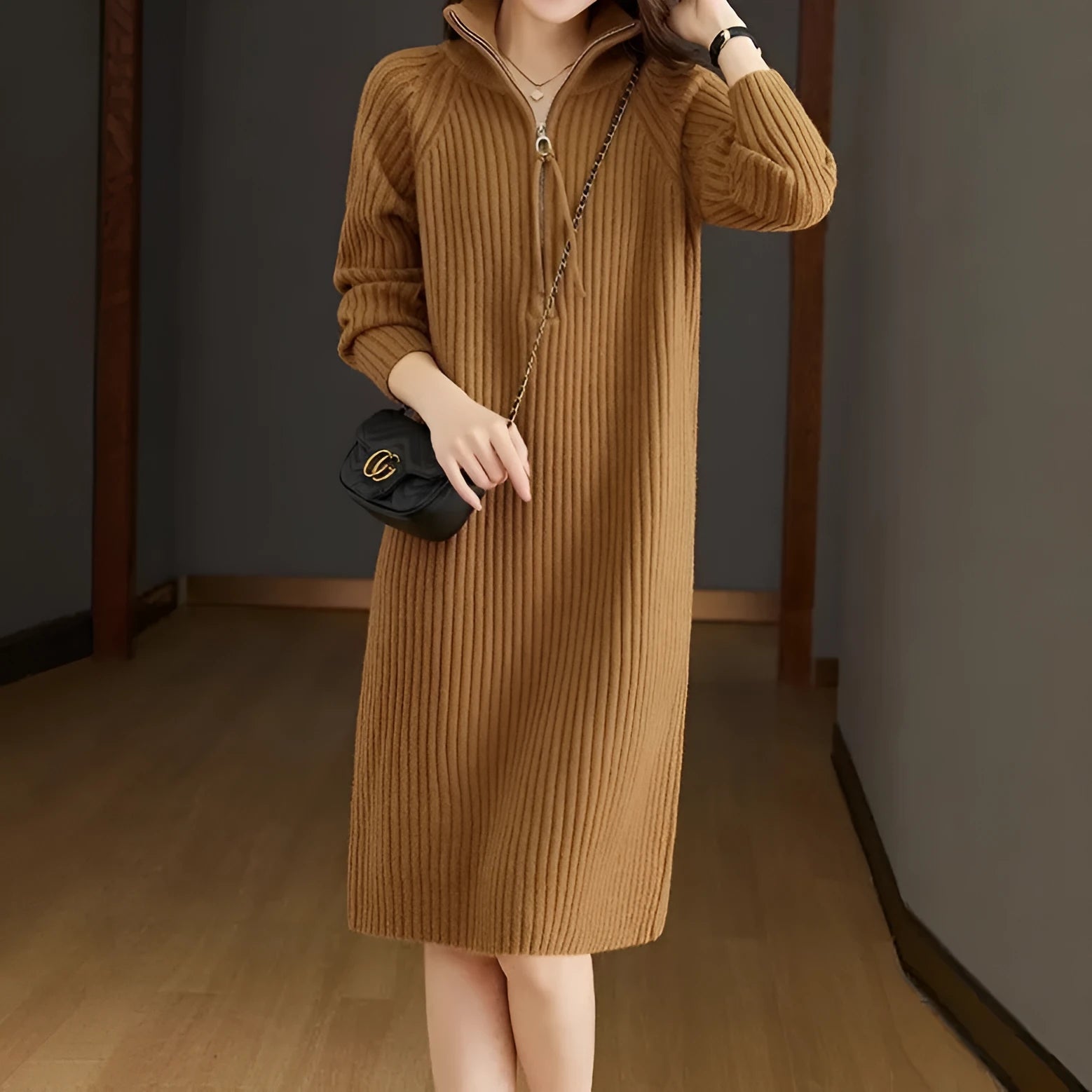 Beige half zip stand collar straight skirt with long sleeves on a mannequin