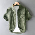 Men's apricot pure cotton loose fit short sleeve casual shirt on a hanger.