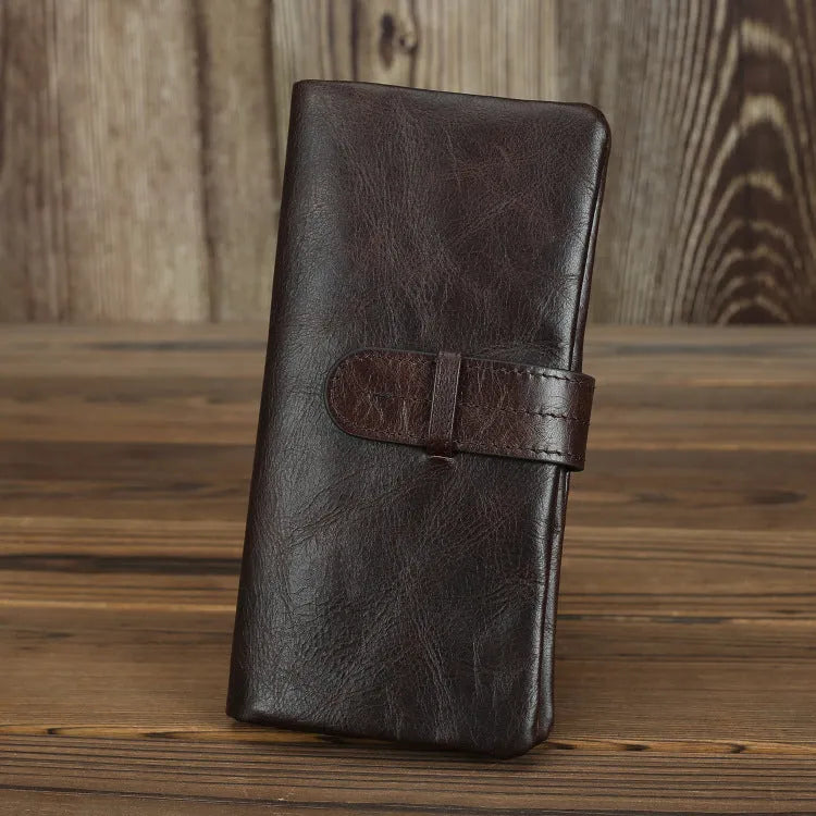 Brown genuine leather women's wallet with multiple card slots and sewing thread detail