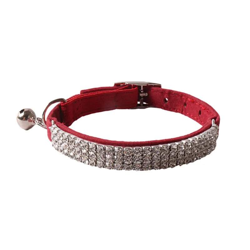 A soft flocking fabric cat collar with a gang drill pattern and an elastic buckle, shown in one of six available colours.