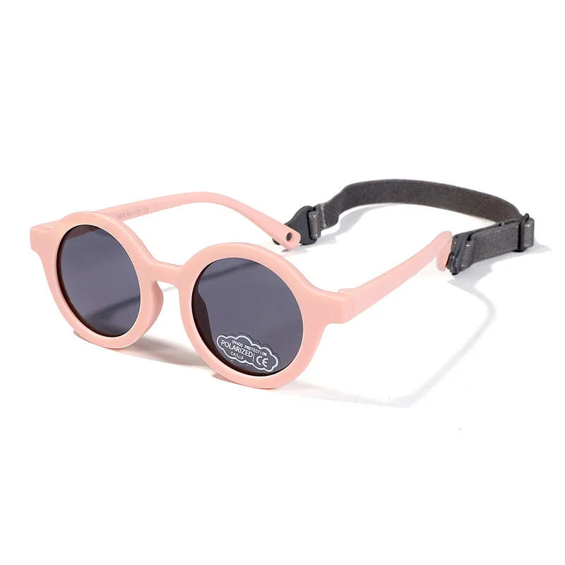 Children's silicone sunglasses for 0-3 year olds with round frame and polarized lenses in multiple colour options