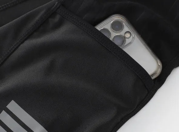 Black shock-absorbing cycling pants with seven-inch inseam and reflective cursor for road mountain biking