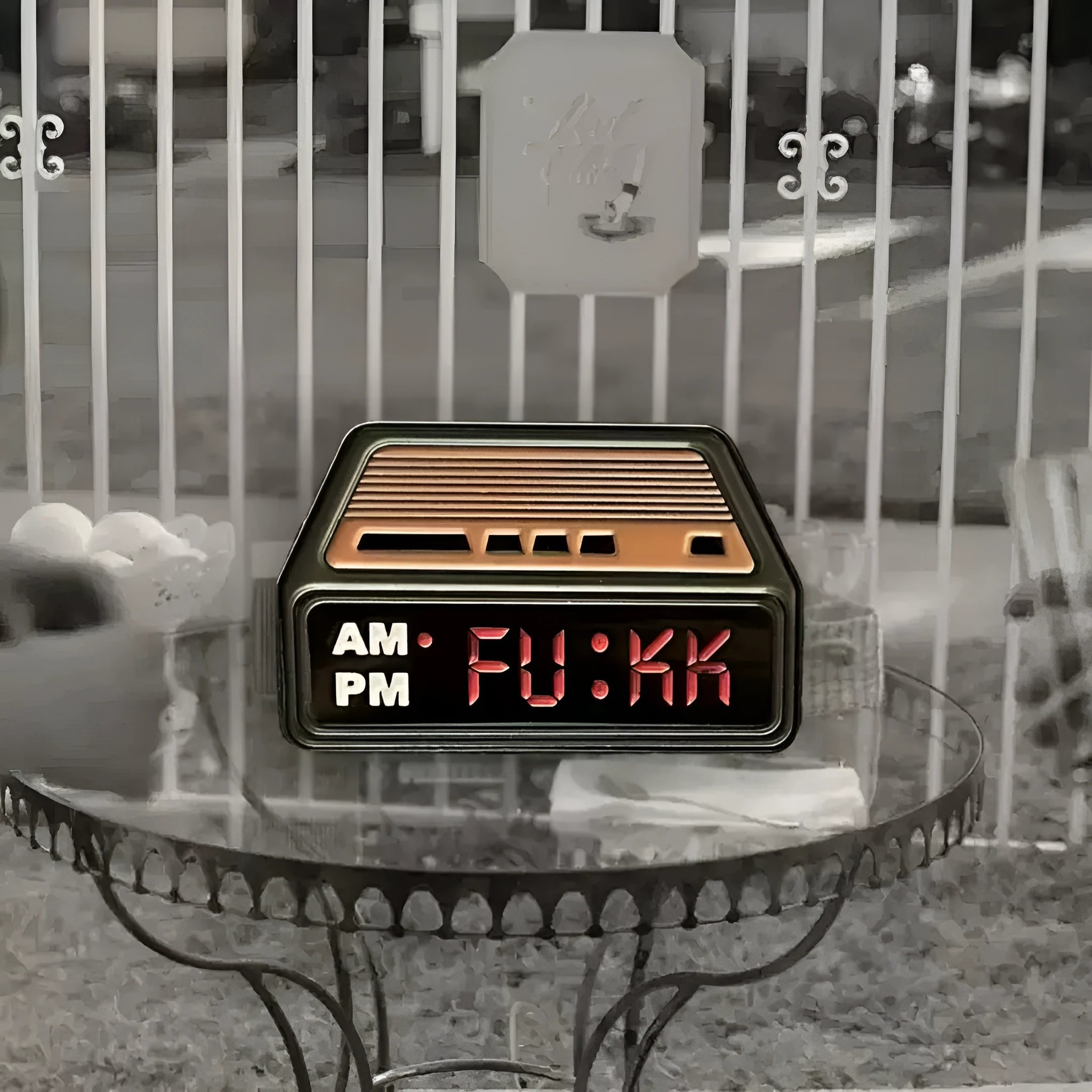 Black metal retro electronic alarm clock brooch pin with original design on a jacket lapel