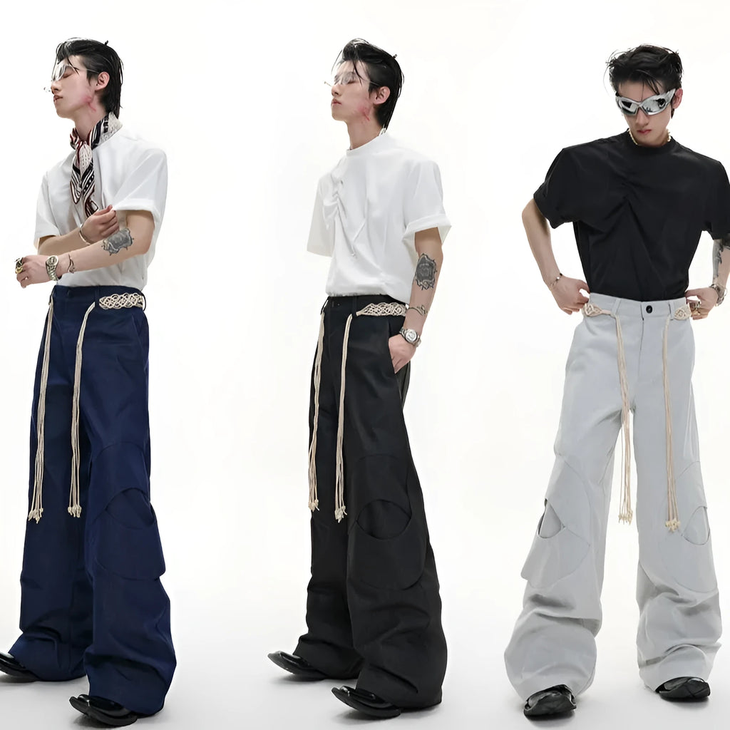 Men's dark blue loose straight-leg trousers with heavy 3D stitching and zipper decorations.