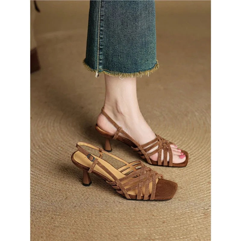 Light brown women's retro sandals with thin cross straps and an adjustable ankle buckle on a 3-6cm heel.