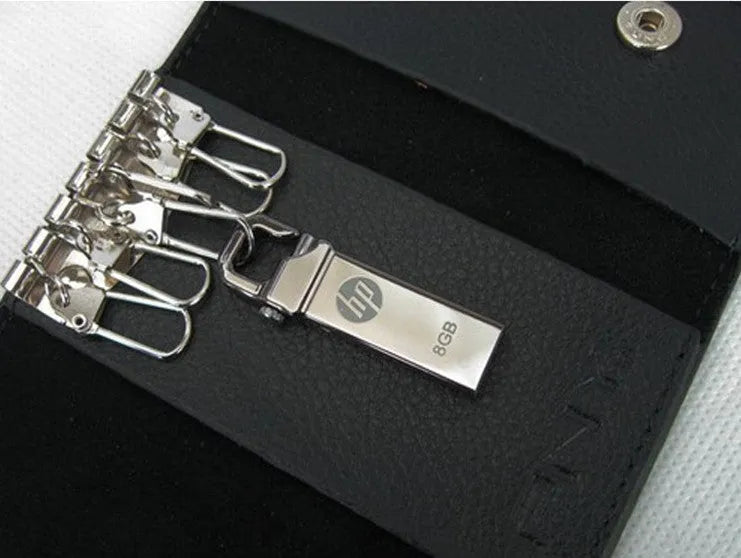 Metal USB flash drive with custom corporate logo, 48.6mm length, on a white background