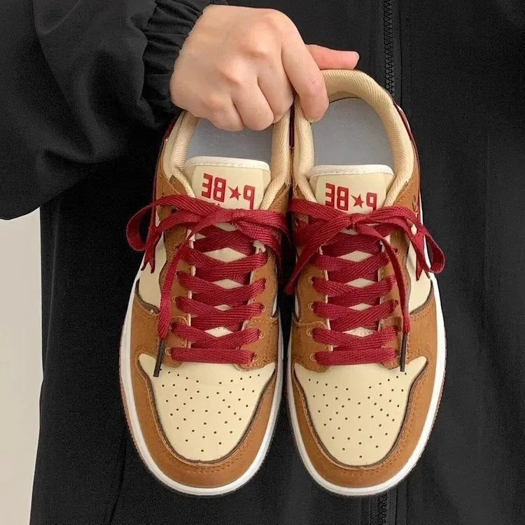 Brown women's platform sneakers with sequin accents and rubber soles