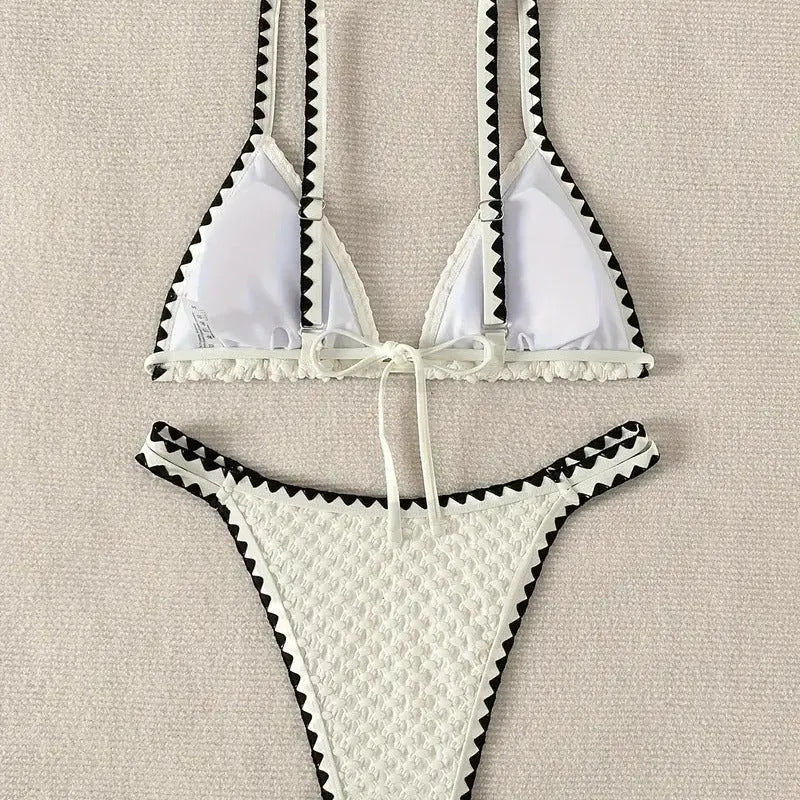 Women's white and blue split bikini swimsuit in polyester fabric with briefs style