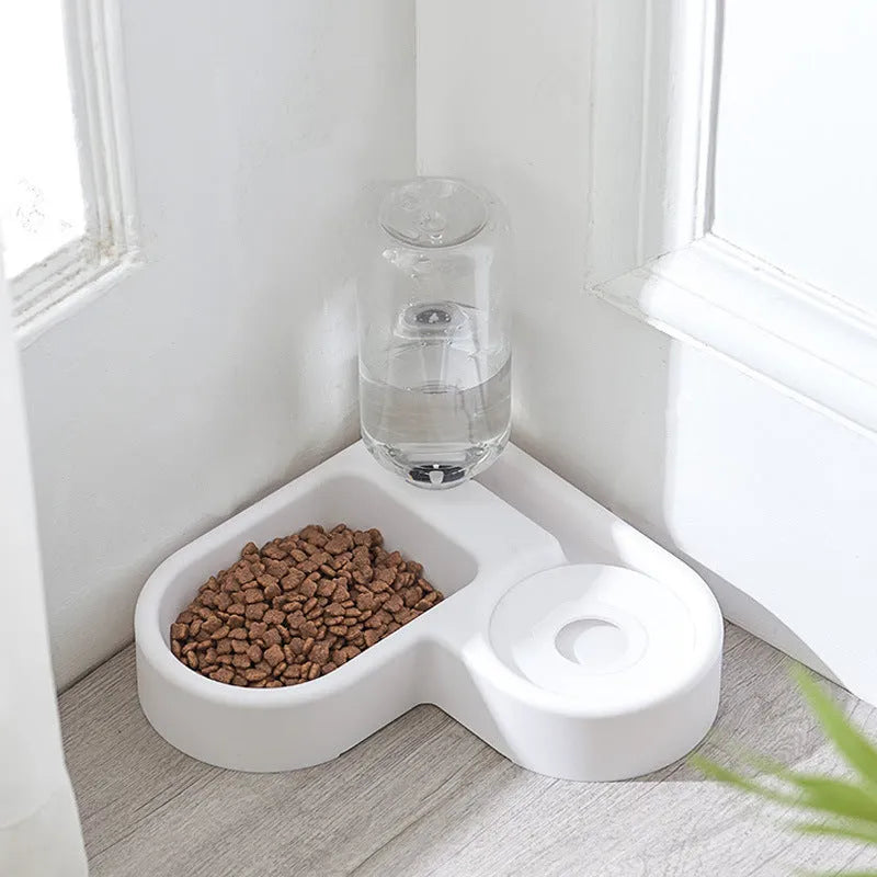 White food-grade silicone pet water fountain with pump and filter on a kitchen floor.