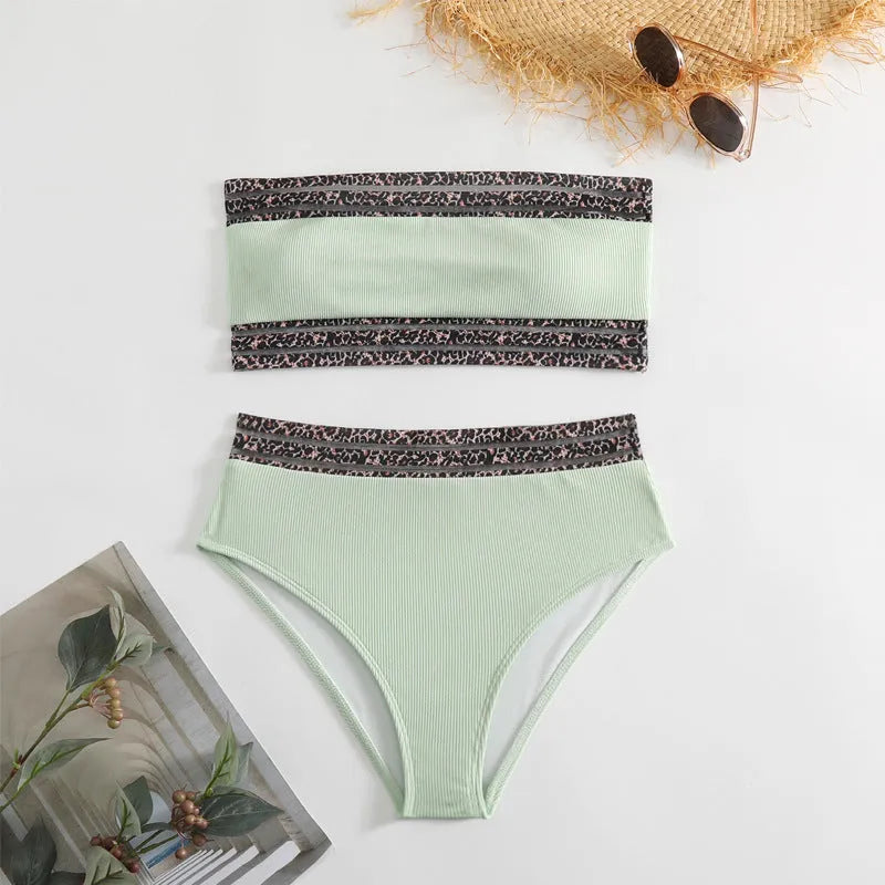 Black strapless swimsuit with leopard print detail on the briefs.