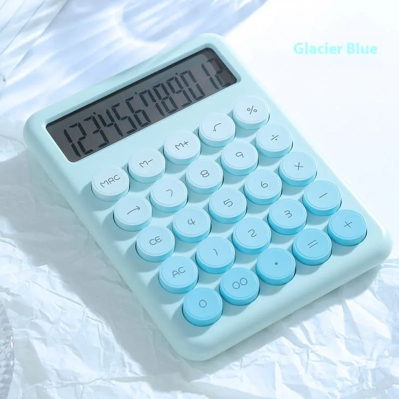 Gradient colour desk calculator in violet, pink, blue, or mint green on a desk.