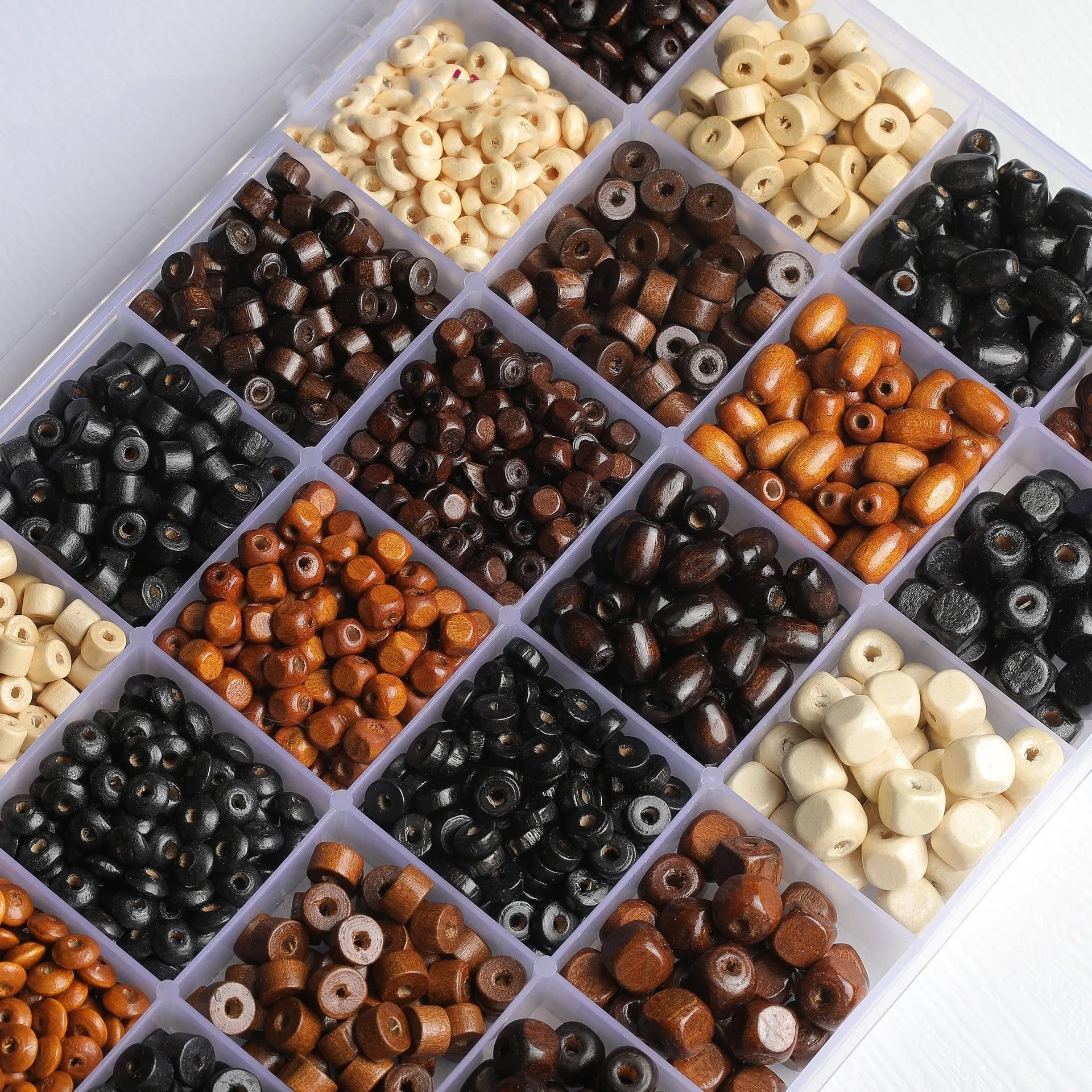 Mixed colour vintage solid wood beads in a 10g pack for DIY jewellery making.