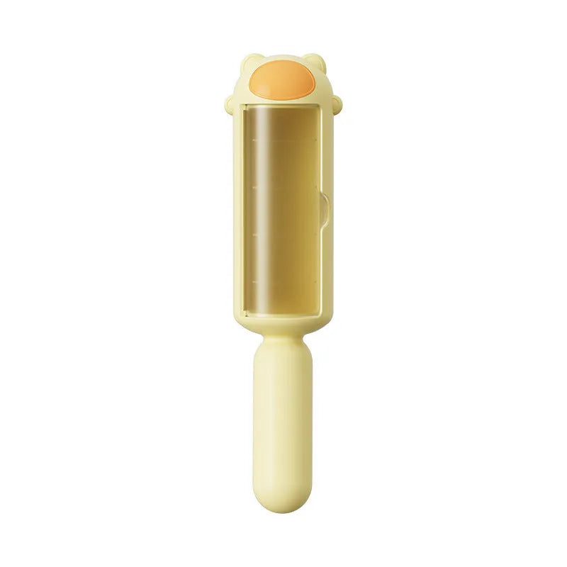 Blue reusable pet hair roller with self-cleaning base for furniture and car seats.