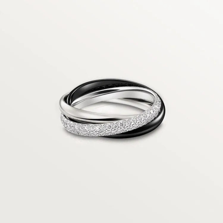 Set of three sterling silver rings with full band of diamonds, showing gold rose and silver black finishes on a geometric U-shaped profile.