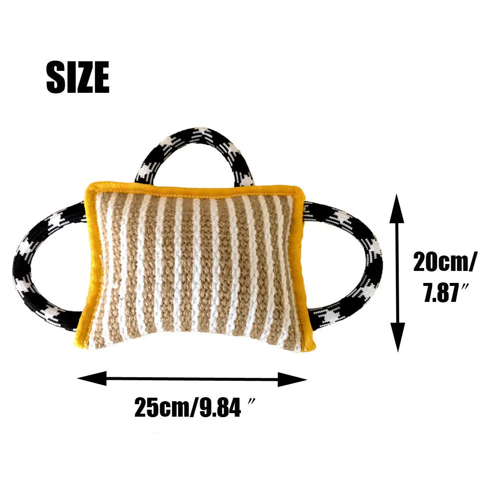 Jute dog tug toy with three rope handles and a central bite pillow, shown in assorted colours.