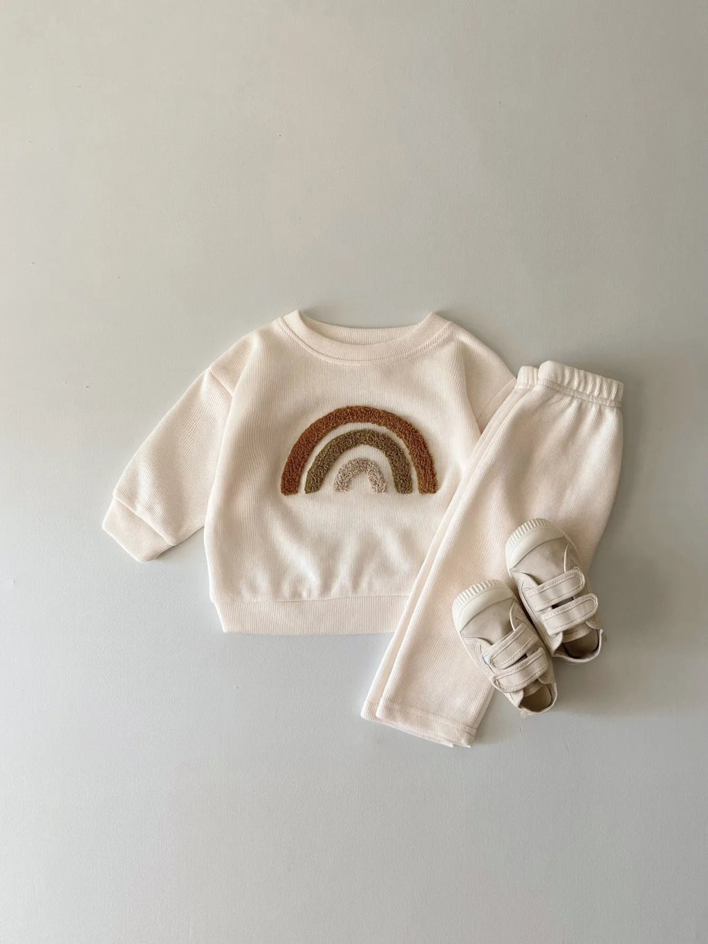 Creamy-white baby cotton two-piece suit with alphabet embroidery on long sleeve blouse and matching trousers