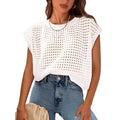 White oversized pullover sweater with textured crochet sleeves on a hanger.