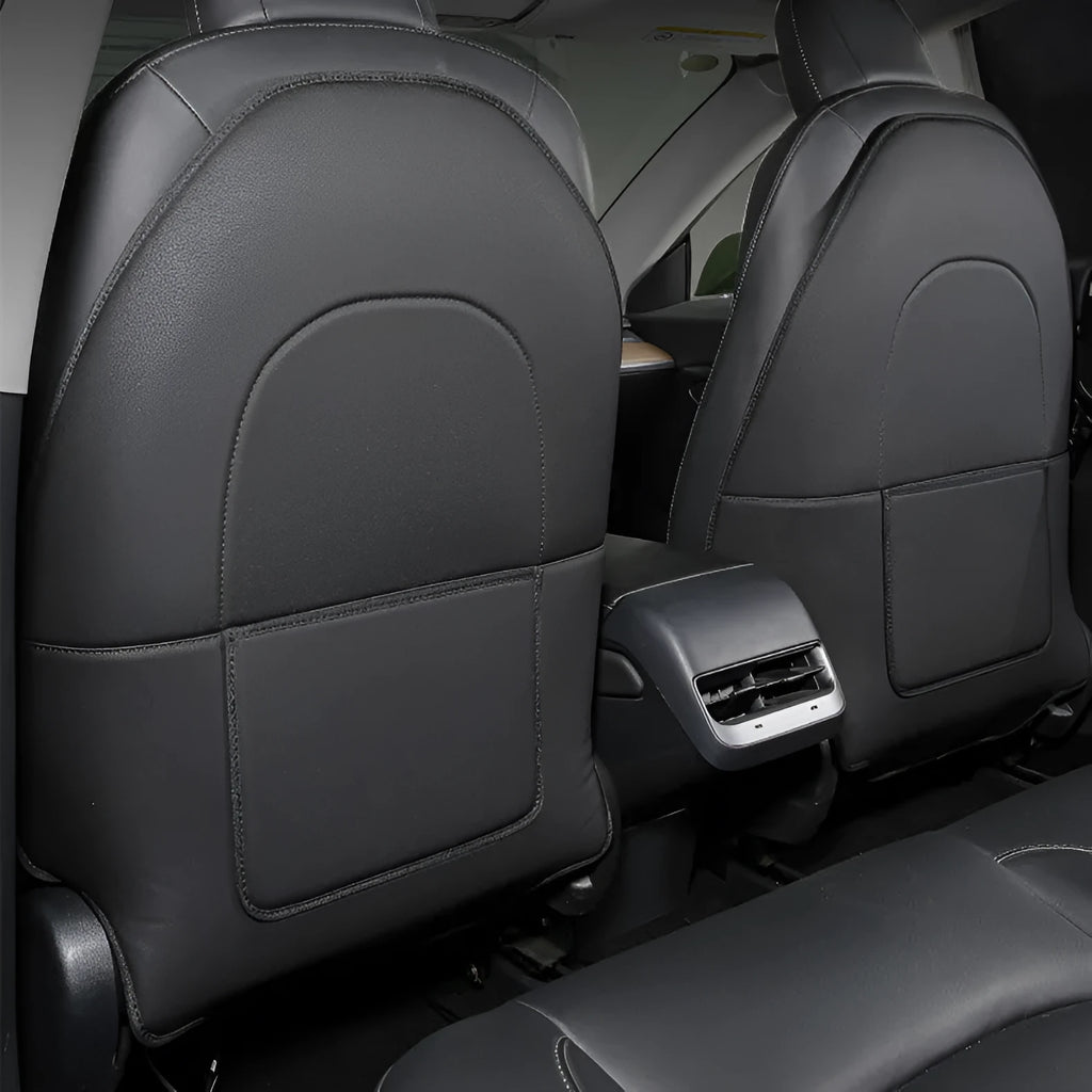 Two black leather rear anti kick pads for car seat back protection.
