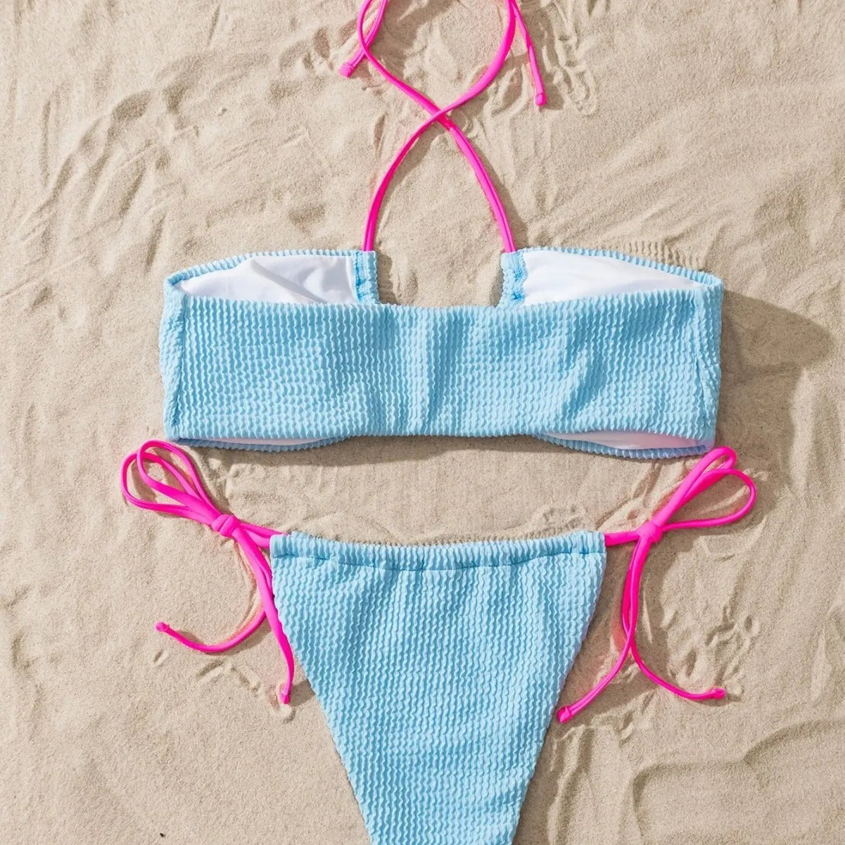 Women's halter neck separated swimsuit with lace-up detail and backless design in solid colour
