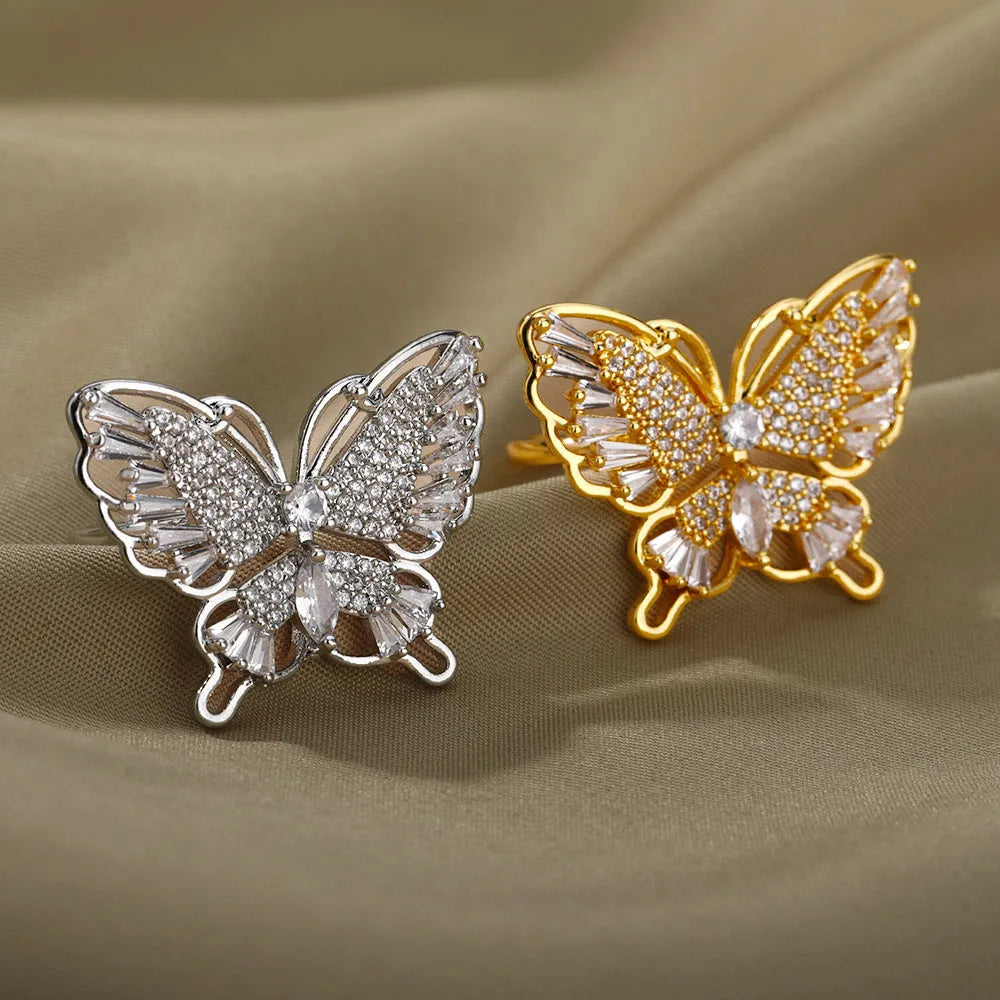 Personality zircon butterfly ring with three-dimensional design in gold tone on a white background