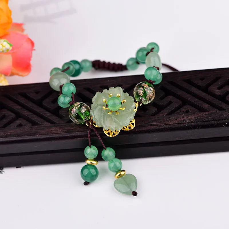 Hand-woven Chinese style bracelet with auspicious patterns and flower design in mixed materials