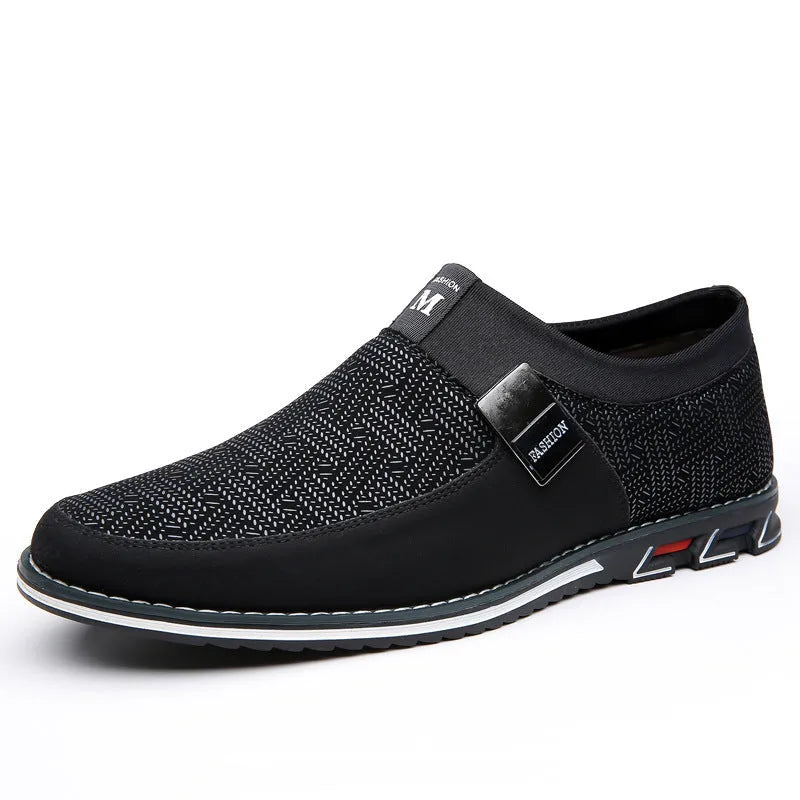 Men's grey and white low-top casual shoes with a square toe and flat rubber sole.