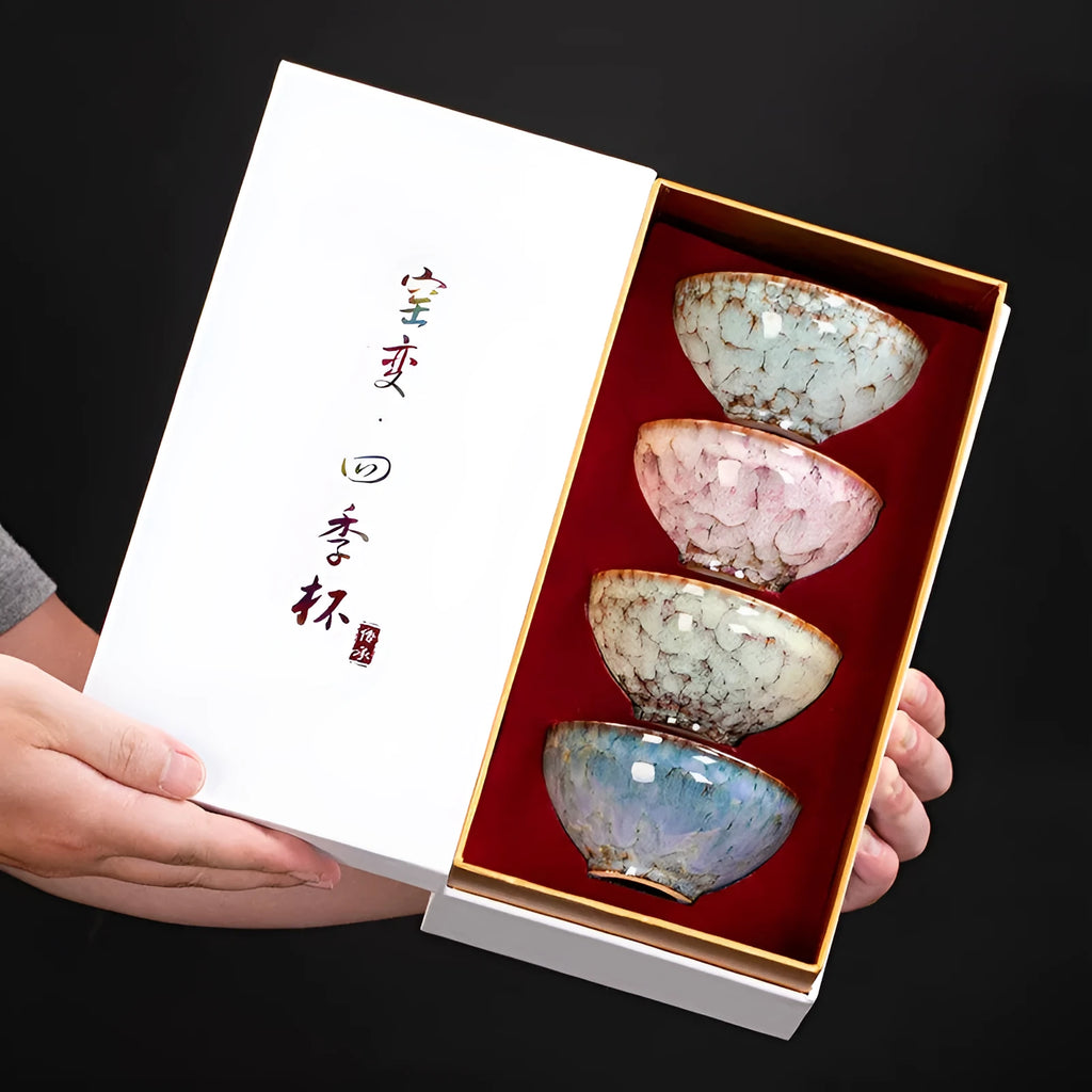 Ceramic Kung Fu tea cup set with four matching cups in light colour gift box