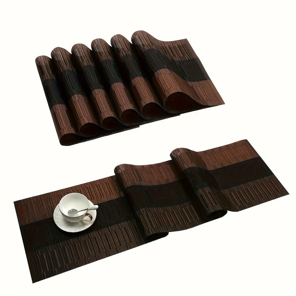 Modern PVC placemat in gradient bamboo design on a wooden dining table.