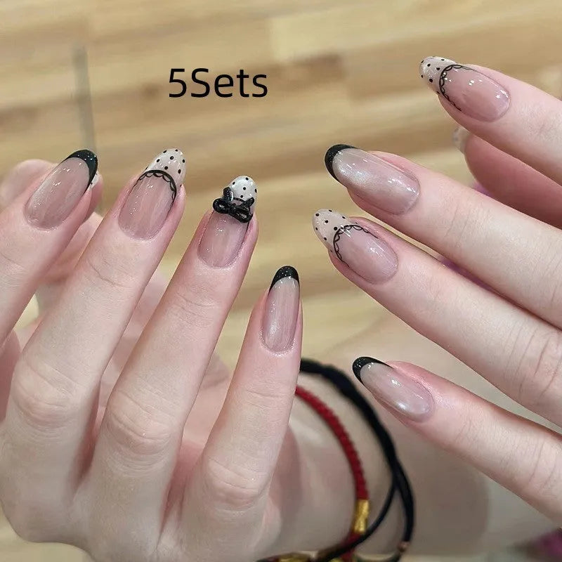 Colourful children's fake nails with pink, blue, purple, and rainbow designs for dress-up play