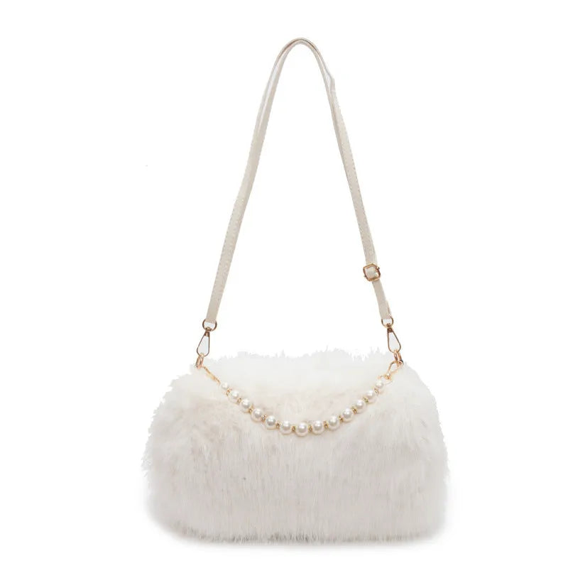 Plush shoulder bag with pearl chain, 27cm wide, shown in black for autumn winter commuting