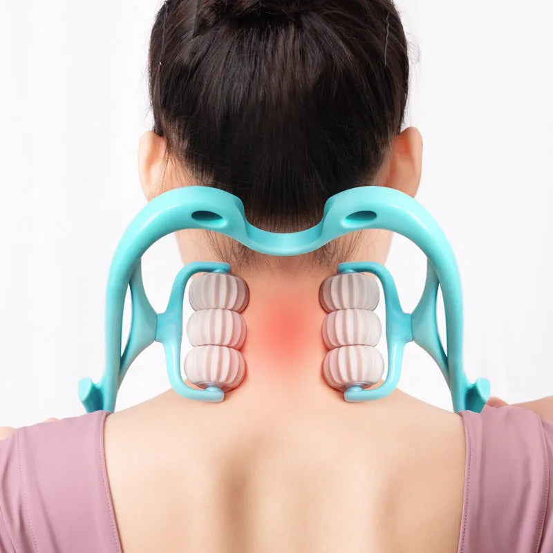 Blue U-shaped electric neck and shoulder massager with six rotating nodes on a table.