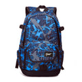 Blue and red classic nylon backpack with large main compartment for school and travel.
