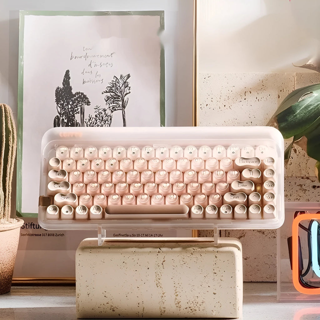 Liquid foundation colour wireless mechanical keyboard bundle with mouse, lamp, and calculator on a desk.