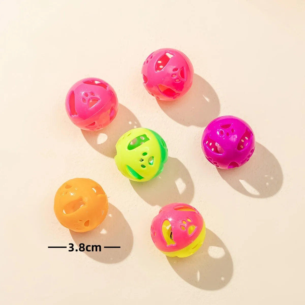 Colored plastic bell mesh hollow sound cat teasing ball in rainbow colour