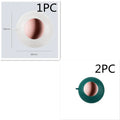 Reusable lint roller hair remover ball in Green Gold colour, removing pet hair from fabric