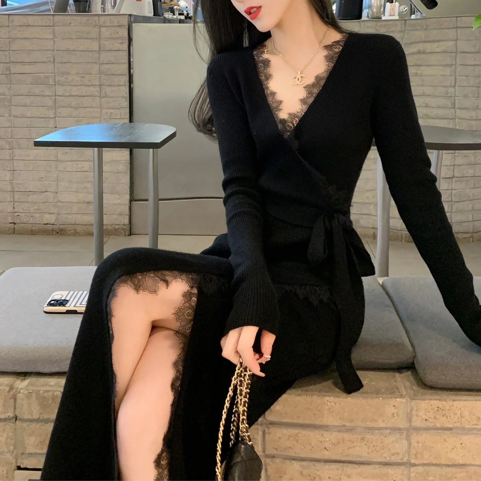 Women's black slim fit skirt with a princess dress silhouette.