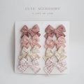 Children's cloth hairclips with dovetail bow design in multiple colour sets including beige brown grid dots