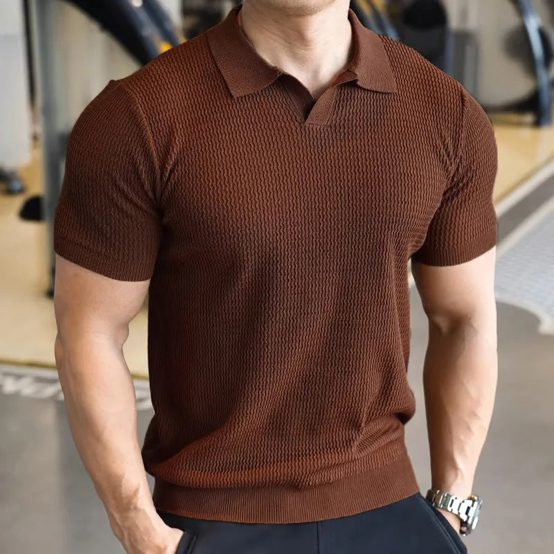 Men's slim fit polo shirt with a button Henry collar in a solid colour.