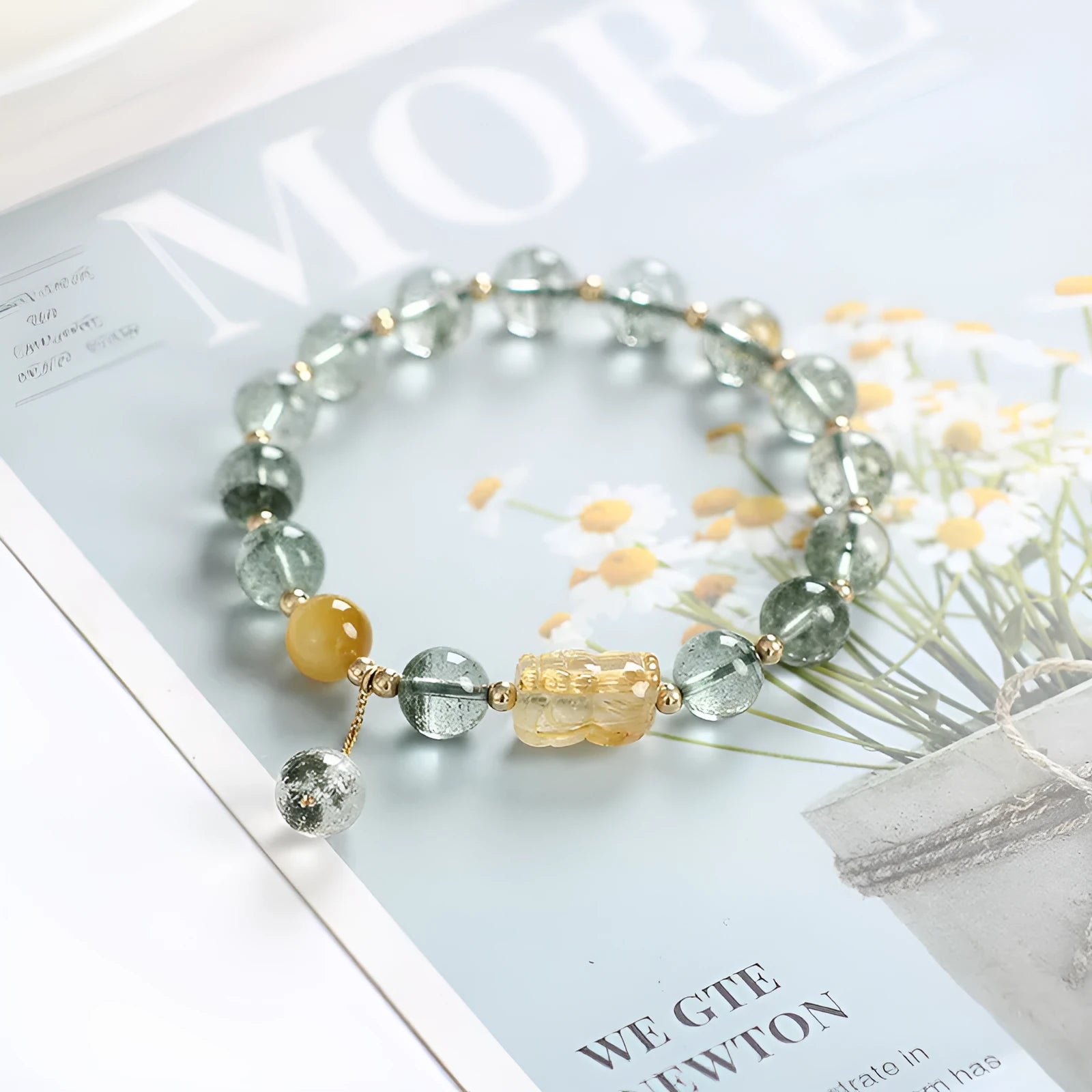 Green phantom quartz crystal bracelet with geometric design and gold rutile accents