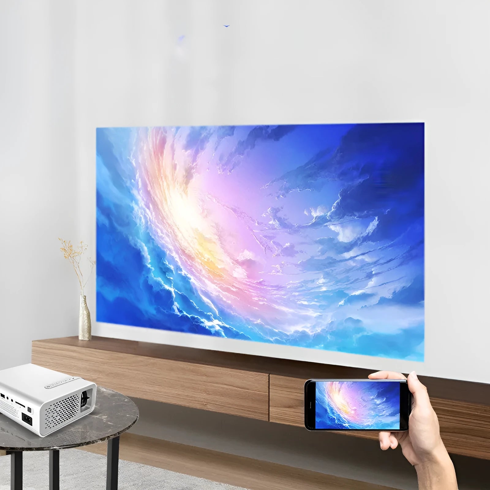 YG530 mini mobile phone projector in black or white with wireless connectivity and international plug adaptors