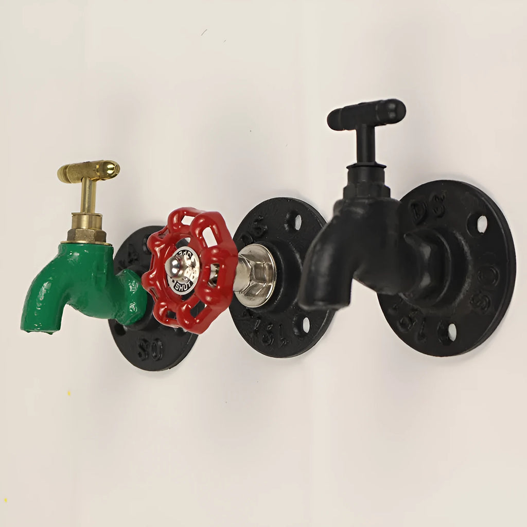 Metal water pipe style wall hanging hook in a choice of colours on a white wall.