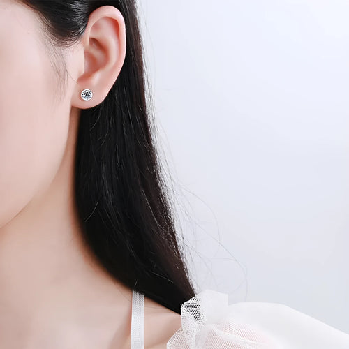 Geometric gold plated women's earrings with a moissanite stone on a 925 silver setting.
