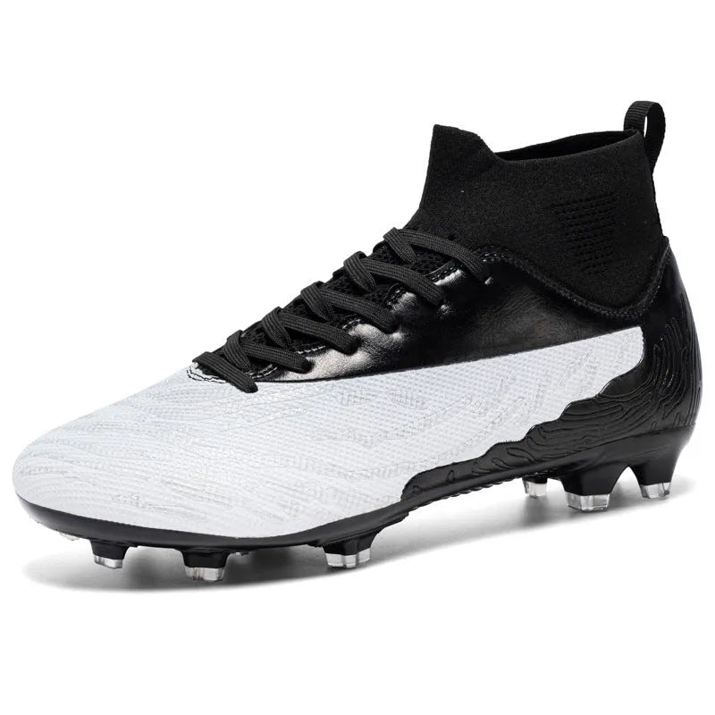 Breathable spike football boots with PVC upper and lace-up closure on grass