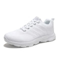 Women's sports running shoes in white with mesh and Flyknit upper, flat heel, and lace-up front